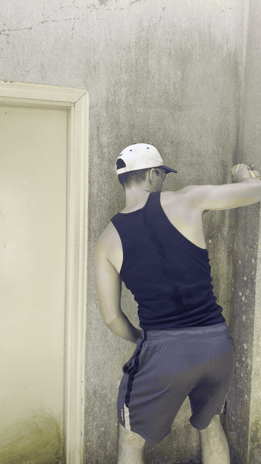 Stucco wall cleaning in action
